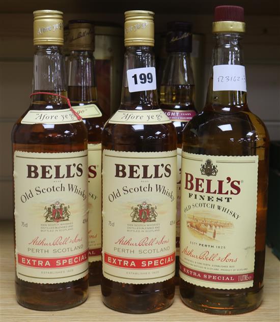 Eight bottles of Bells 8 year old whisky (3 in box), two Bells Extra Special whisky, and one litre Bells Extra Special Whisky